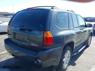 2007 GMC Envoy Denali with VIN 1GKET63M672231311, listed as a IAAI auction lot 41992787 with 212,145 mi miles. Bid and sale history available at carsss.com. Image 4.