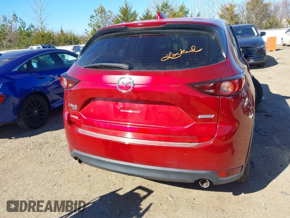 2019 Mazda CX-5 Sport with VIN JM3KFBBM2K0508743, listed as a IAAI auction lot 41288659 with 77,710 mi miles and . Bid and sale history available at DreamBid. Image 16.