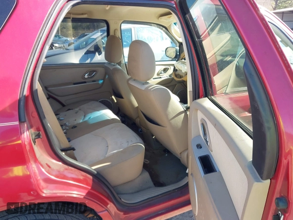 2006 Mercury Mariner Convenience with VIN 4M2YU56Z86KJ00414, listed as a IAAI auction lot 41251382 with 226,013 mi miles and . Bid and sale history available at DreamBid. Image 8.