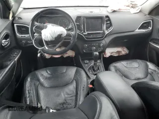 2019 Jeep Cherokee Limited z VIN 1C4PJMDXXKD409564, wystawiony jako Copart lot #60893225 z przebiegiem 128 674 mil mil oraz Szkoda całkowita • Salvage title. Historia ofert i sprzedaży dostępna na DreamBid. Obrazek 8.