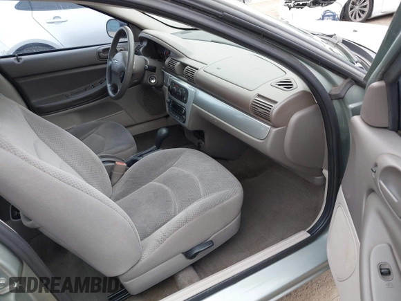 2006 Chrysler Sebring Touring z VIN 1C3AL56R66N126068, wystawiony jako IAAI lot #42210890 z przebiegiem 161 335 mil mil oraz . Historia ofert i sprzedaży dostępna na DreamBid. Obrazek 5.