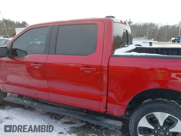 2023 Ford F-150 Lightning Pro with VIN 1FT6W1EV2PWG16485, listed as a IAAI auction lot 41496664 with 7,171 mi miles and . Bid and sale history available at DreamBid. Image 14.