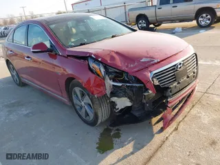 2016 Hyundai Sonata Hybrid Limited with VIN KMHE34L12GA021635, listed as a IAAI auction lot 41773019 with 152,826 mi miles. Bid and sale history available at carsss.com. Image 6.