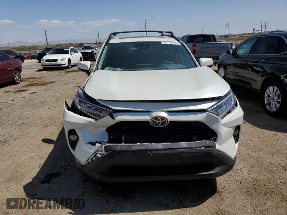 2021 Toyota RAV4 XLE Premium with VIN 2T3C1RFV0MW153089, listed as a Copart auction lot 60759615 with 28,153 mi miles and Salvage title. Bid and sale history available at DreamBid. Image 5.