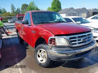 1999 Ford F-150 with VIN 1FTZF1723XNA23062, listed as a IAAI auction lot 42019826 with 232,648 mi miles and . Bid and sale history available at DreamBid. Image 1.