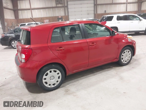2008 Scion xD with VIN JTKKU10418J031679, listed as a IAAI auction lot 42087002 with 200,802 mi miles. Bid and sale history available at carsss.com. Image 4.