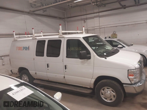 2012 Ford Econoline Cargo Recreational with VIN 1FTNE2EW4CDB03757, listed as a IAAI auction lot 42072612 with 147,153 mi miles. Bid and sale history available at carsss.com. Image 13.