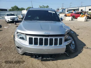 2014 Jeep Grand Cherokee Limited z VIN 1C4RJFBG7EC204799, wystawiony jako Copart lot #62458805 z przebiegiem 126 966 mil mil oraz Szkoda całkowita • Salvage title. Historia ofert i sprzedaży dostępna na DreamBid. Obrazek 5.