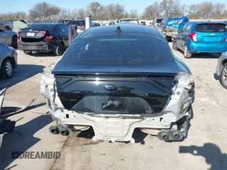 2018 Kia Stinger with VIN KNAE15LA5J6031079, listed as a IAAI auction lot 41137507 with 82,911 mi miles and . Bid and sale history available at DreamBid. Image 17.