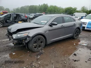 2013 Ford Taurus SEL z VIN 1FAHP2E87DG104349, wystawiony jako Copart lot #57143135 z przebiegiem 129 927 mil mil oraz Szkoda całkowita • Salvage title. Historia ofert i sprzedaży dostępna na DreamBid. Obrazek 1.