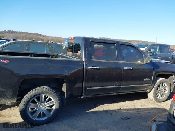 2014 Chevrolet Silverado 1500 High Country with VIN 3GCUKTEC1EG437170, listed as a IAAI auction lot 41742882 with 101,779 mi miles. Bid and sale history available at carsss.com. Image 13.