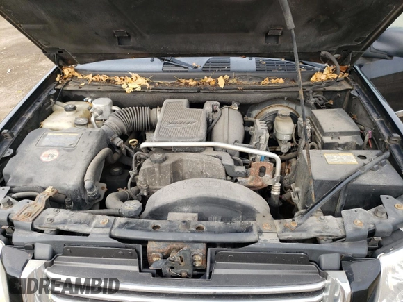 2007 GMC Envoy SLT with VIN 1GKDT13S972197393, listed as a Copart auction lot 77958764 with 151,586 mi miles and Salvage Title. Bid and sale history available at DreamBid. Image 12.