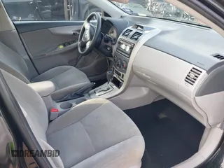 2012 Toyota Corolla L with VIN 2T1BU4EE9CC802405, listed as a IAAI auction lot 41962255 with 209,968 mi miles. Bid and sale history available at carsss.com. Image 5.