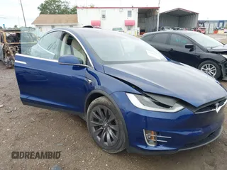 2018 Tesla Model X 75D with VIN 5YJXCAE2XJF111180, listed as a IAAI auction lot 41988079 with 114,593 mi miles and . Bid and sale history available at DreamBid. Image 1.