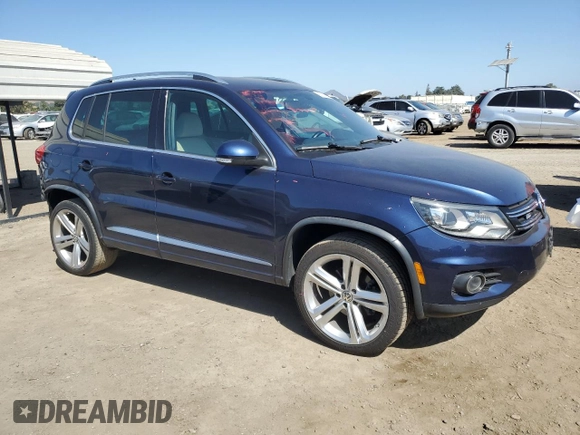 2015 Volkswagen Tiguan SE with VIN WVGAV7AX2FW094359, listed as a Copart auction lot 60101885 with 106,305 mi miles and Salvage title. Bid and sale history available at DreamBid. Image 4.