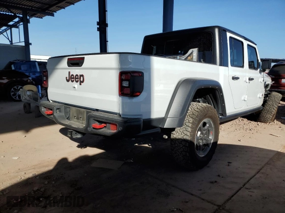 2022 Jeep Gladiator Rubicon with VIN 1C6JJTBG3NL103293, listed as a Copart auction lot 45599755 with Not provided miles and Salvage title. Bid and sale history available at DreamBid. Image 3.