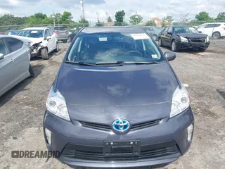 2014 Toyota Prius Four z VIN JTDKN3DUXE1816059, wystawiony jako IAAI lot #42268497 z przebiegiem 78 825 mil mil oraz . Historia ofert i sprzedaży dostępna na DreamBid. Obrazek 12.
