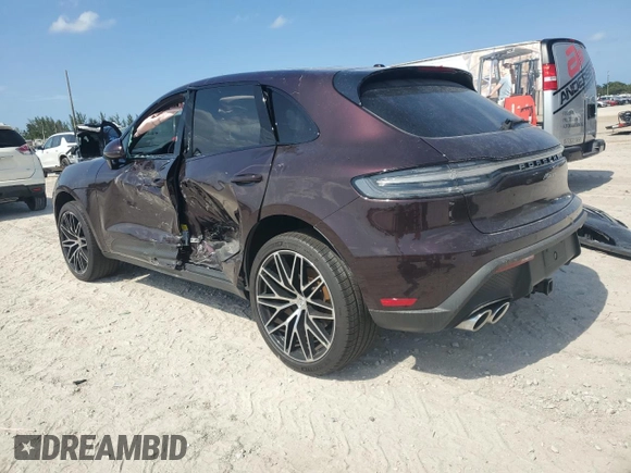 2024 Porsche Macan with VIN WP1AA2A53RLB14849, listed as a Copart auction lot 57979155 with 10,031 mi miles and Salvage title. Bid and sale history available at DreamBid. Image 2.
