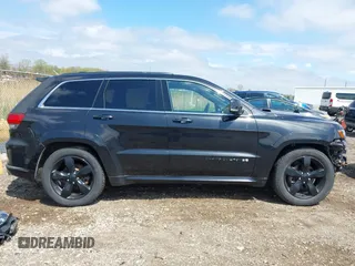 2016 Jeep Grand Cherokee High Altitude z VIN 1C4RJFCGXGC334335, wystawiony jako IAAI lot #42188996 z przebiegiem 212 689 mil mil oraz . Historia ofert i sprzedaży dostępna na DreamBid. Obrazek 14.