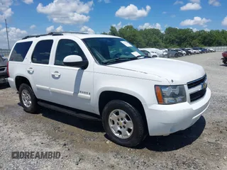 2007 Chevrolet Tahoe LT with VIN 1GNFC13007J384912, listed as a IAAI auction lot 42530843 with 331,040 mi miles and . Bid and sale history available at DreamBid. Image 1.