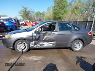 2011 Ford Focus SE with VIN 1FAHP3FN4BW118304, listed as a IAAI auction lot 42031650 with 60,031 mi miles and . Bid and sale history available at DreamBid. Image 14.