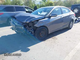 2013 Hyundai Accent GLS z VIN KMHCT4AE1DU542207, wystawiony jako IAAI lot #42174737 z przebiegiem 143 757 mil mil oraz . Historia ofert i sprzedaży dostępna na DreamBid. Obrazek 2.