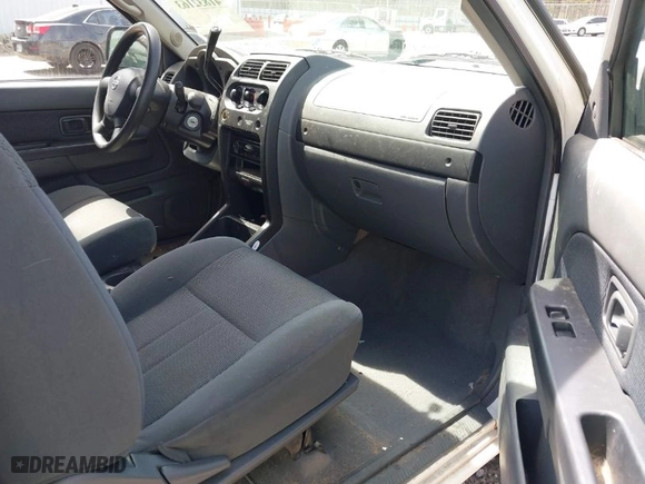 2004 Nissan Frontier 2WD XE with VIN 1N6DD26T44C474490, listed as a IAAI auction lot 41832163 with 253,734 mi miles. Bid and sale history available at carsss.com. Image 5.