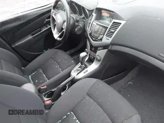 2014 Chevrolet Cruze 1LT with VIN 1G1PC5SB6E7233051, listed as a IAAI auction lot 42214334 with 88,389 mi miles and . Bid and sale history available at DreamBid. Image 5.