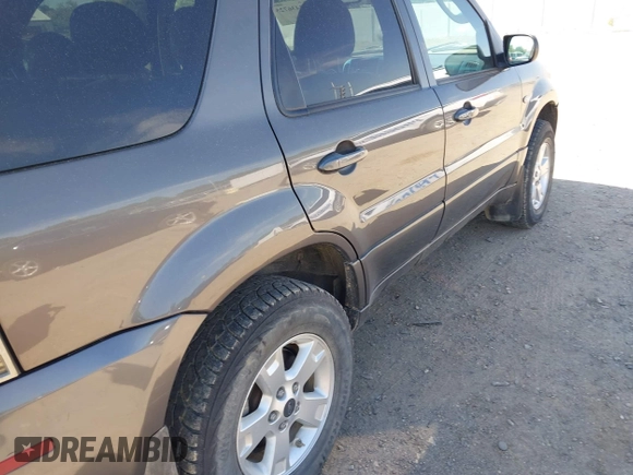2006 Mercury Mariner Luxury с VIN 4M2CU57116KJ19454, выставлен на аукционе IAAI как лот 42436725 с пробегом 244 689 миль миль и . История ставок и продаж доступна на DreamBid. Изображение 13.