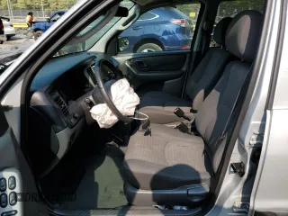 2003 Mazda Tribute DX with VIN 4F2YZ02B83KM52472, listed as a Copart auction lot 68642804 with 179,193 mi miles and Salvage Title. Bid and sale history available at carsss.com. Image 7.