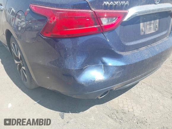 2016 Nissan Maxima SV z VIN 1N4AA6AP3GC386959, wystawiony jako IAAI lot #41886544 z przebiegiem 155 362 mil mil oraz . Historia ofert i sprzedaży dostępna na DreamBid. Obrazek 6.
