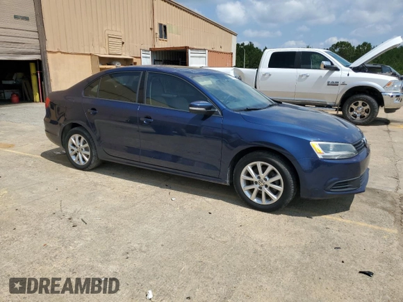 2011 Volkswagen Jetta SE with VIN 3VWDX7AJ8BM022225, listed as a Copart auction lot 60039795 with 101,887 mi miles and Clean title. Bid and sale history available at DreamBid. Image 4.