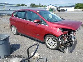 2016 Ford C-Max Energi SEL with VIN 1FADP5CU9GL116093, listed as a Copart auction lot 65725374 with 29,497 mi miles and Salvage Title. Bid and sale history available at carsss.com. Image 4.