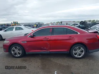 2015 Ford Taurus SEL with VIN 1FAHP2E8XFG137526, listed as a IAAI auction lot 41909658 with 147,992 mi miles and . Bid and sale history available at carsss.com. Image 14.