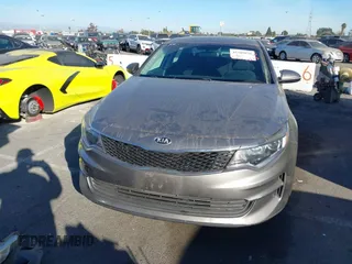 2018 Kia Optima LX with VIN 5XXGT4L32JG256921, listed as a IAAI auction lot 41389850 with 91,013 mi miles and . Bid and sale history available at DreamBid. Image 11.