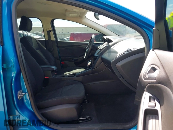 2015 Ford Focus SE with VIN 1FADP3F21FL379837, listed as a IAAI auction lot 42021623 with 146,571 mi miles. Bid and sale history available at carsss.com. Image 5.