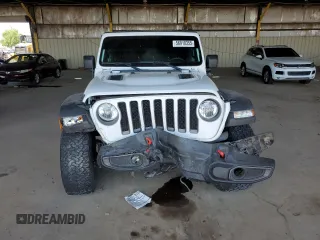 2021 Jeep Wrangler Unlimited Rubicon z VIN 1C4JJXFG5MW767036, wystawiony jako Copart lot #56918355 z przebiegiem 52 994 mil mil oraz Szkoda całkowita • Salvage title. Historia ofert i sprzedaży dostępna na DreamBid. Obrazek 5.