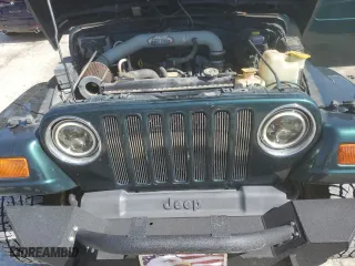 1999 Jeep Wrangler Sahara with VIN 1J4FY49S6XP478675, listed as a Copart auction lot 52147605 with 157,971 mi miles and Salvage Title. Bid and sale history available at carsss.com. Image 11.