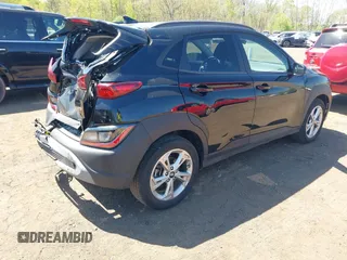 2023 Hyundai Kona SEL with VIN KM8K6CAB3PU012120, listed as a IAAI auction lot 42134639 with 15,057 mi miles and . Bid and sale history available at DreamBid. Image 4.