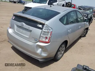 2008 Toyota Prius z VIN JTDKB20U087779744, wystawiony jako IAAI lot #40013342 z przebiegiem 84 999 mil mil oraz . Historia ofert i sprzedaży dostępna na DreamBid. Obrazek 4.