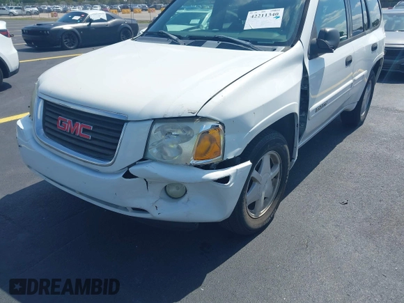 2003 GMC Envoy SLT z VIN 1GKDS13S532221928, wystawiony jako IAAI lot #42211340 z przebiegiem 149 902 mil mil oraz . Historia ofert i sprzedaży dostępna na DreamBid. Obrazek 6.