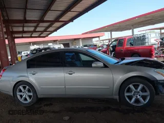 2005 Nissan Maxima SE with VIN 1N4BA41E55C873827, listed as a IAAI auction lot 42433330 with 173,473 mi miles and . Bid and sale history available at DreamBid. Image 14.