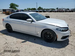 2019 BMW 5 Series 530e with VIN WBAJA9C50KB253692, listed as a Copart auction lot 52568095 with 61,023 mi miles and Salvage title. Bid and sale history available at DreamBid. Image 4.