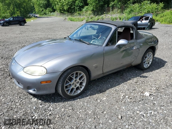 2002 Mazda MX-5 Miata Cloth z VIN JM1NB353520224582, wystawiony jako Copart lot #63669835 z przebiegiem 88 455 mil mil oraz Szkoda całkowita • Salvage title. Historia ofert i sprzedaży dostępna na DreamBid. Obrazek 1.