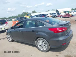 2017 Ford Focus Titanium with VIN 1FADP3J27HL306546, listed as a IAAI auction lot 42480576 with 114,285 mi miles and . Bid and sale history available at DreamBid. Image 15.