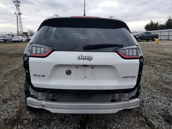 2019 Jeep Cherokee Limited with VIN 1C4PJMDX6KD481118, listed as a Copart auction lot 87417844 with 56,867 mi miles and Salvage Title. Bid and sale history available at DreamBid. Image 6.
