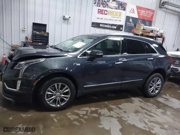 2021 Cadillac XT5 AWD Premium Luxury with VIN 1GYKNDRS1MZ148806, listed as a IAAI auction lot 41269703 with 31,739 mi miles. Bid and sale history available at carsss.com. Image 14.