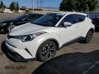 2018 Toyota C-HR XLE z VIN NMTKHMBX6JR005820, wystawiony jako Copart lot #58297455 z przebiegiem 63 745 mil mil oraz Szkoda całkowita • Salvage title. Historia ofert i sprzedaży dostępna na DreamBid. Obrazek 1.