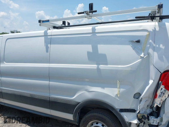 2024 Ford Transit Cargo with VIN 1FTBR1Y89RKA77093, listed as a IAAI auction lot 42556386 with 3,290 mi miles and . Bid and sale history available at DreamBid. Image 14.
