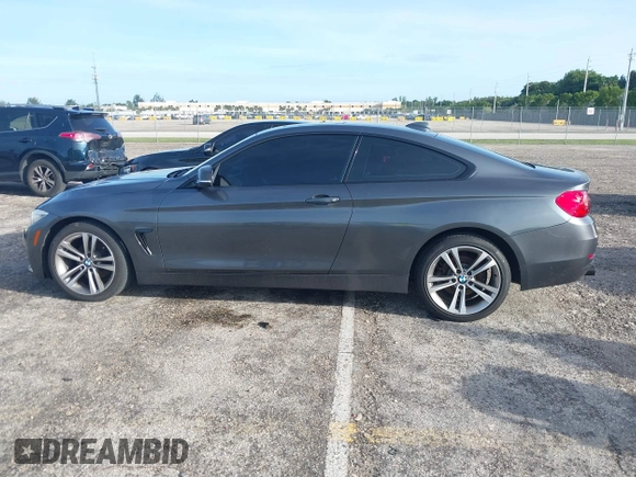 2014 BMW 4 Series 428i xDrive with VIN WBA3N5C57EK196790, listed as a IAAI auction lot 40571670 with 108,114 mi miles and . Bid and sale history available at DreamBid. Image 14.